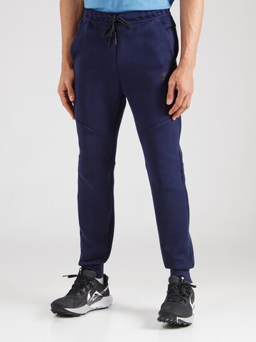 Nike Sportswear Tapered Παντελόνι 'TCH FLC' σε μπλε: μπροστά
