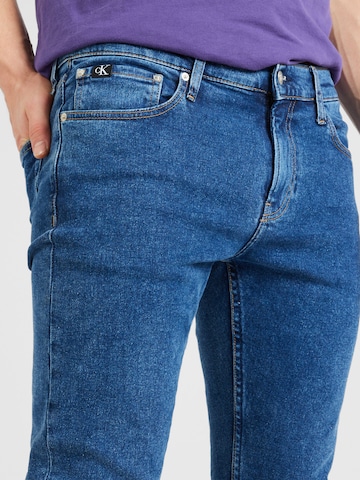 Calvin Klein Jeans Úzky strih Džínsy 'SLIM' - Modrá