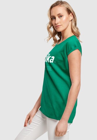 Mister Tee Shirt 'Fika Definition' in Green