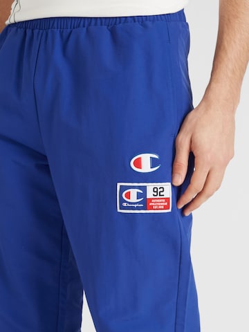 Champion Authentic Athletic Apparel Lużny krój Spodnie w kolorze niebieski