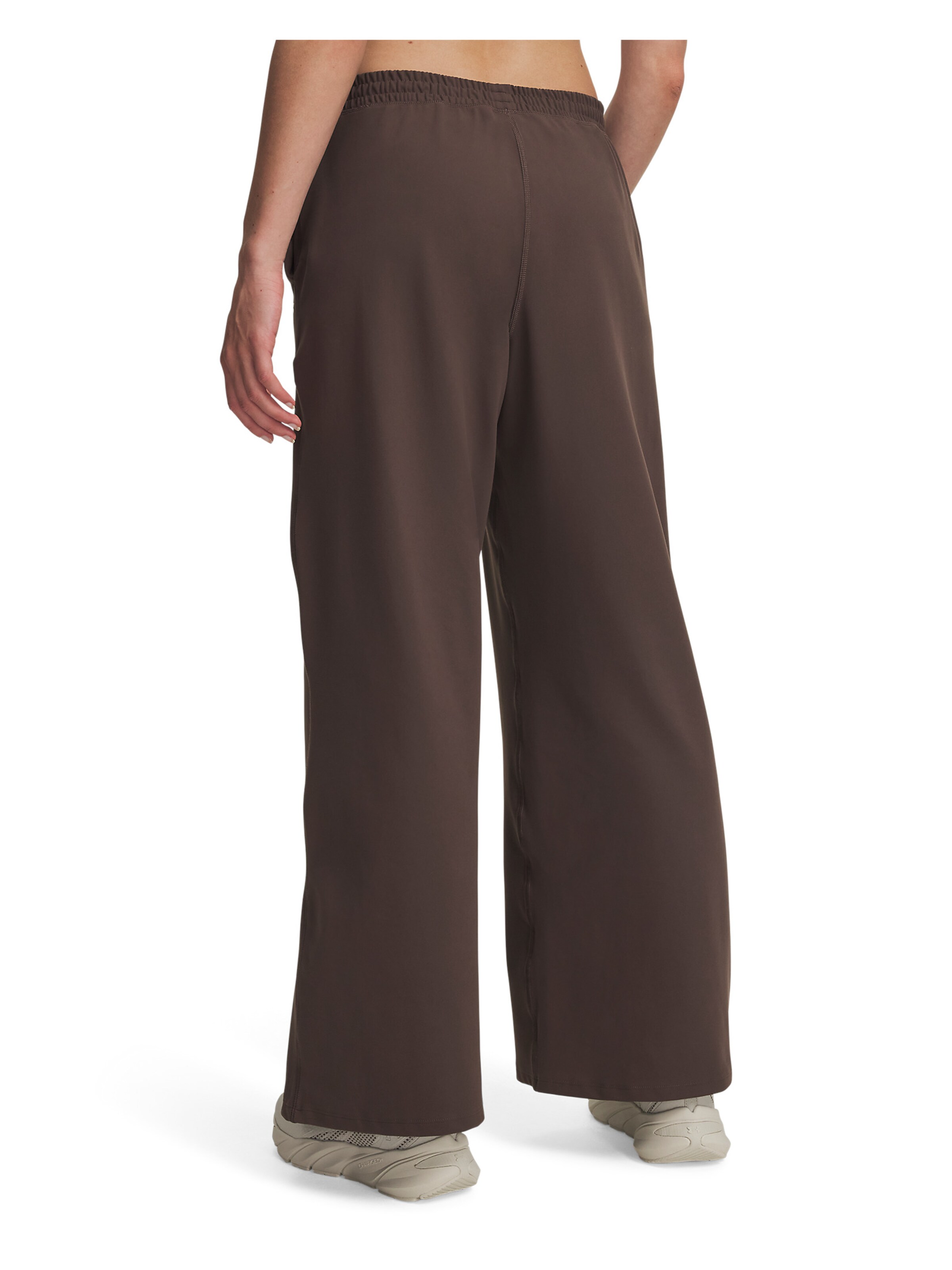 UNDER ARMOUR Wide leg Sportbroek 'Motion' in Bruin