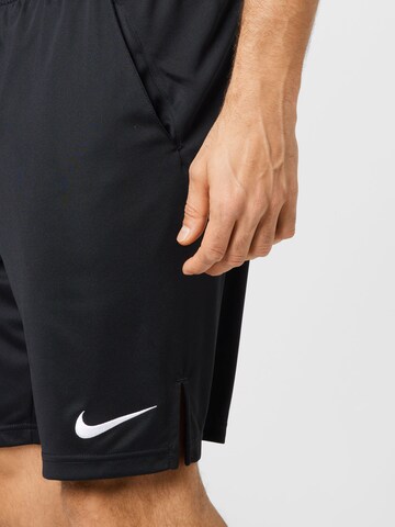 Regular Pantalon de sport NIKE en noir