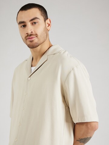 ABOUT YOU x Kevin Trapp Comfort fit Button Up Shirt 'Mika' in Beige