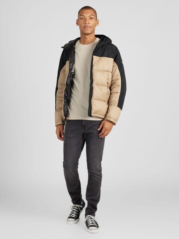 Champion Authentic Athletic Apparel Between-Season Jacket 'Legacy' in Beige