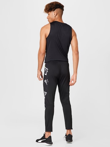 PUMA Tapered Sportbroek in Zwart