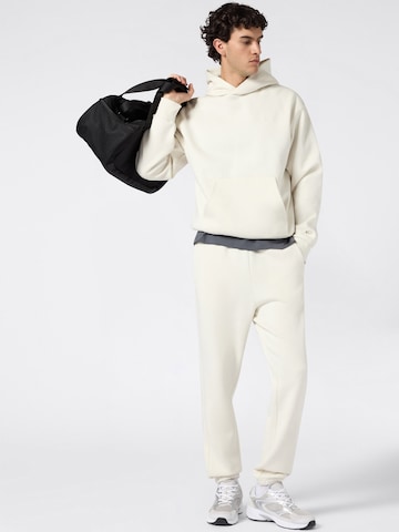 Champion Authentic Athletic Apparel Sweatshirt i hvid