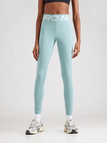 NIKE Skinny Sportbroek in Groen: voorkant