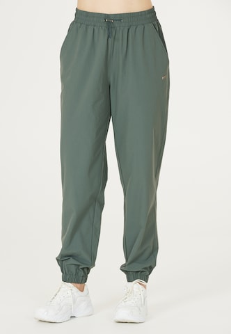 Athlecia Regular Workout Pants 'Hero' in Green: front