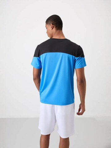 T-Shirt fonctionnel Tommy Life en bleu