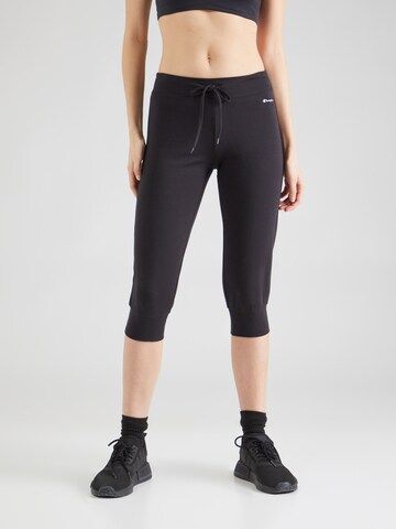 Effilé Pantalon de sport Champion Authentic Athletic Apparel en noir : devant