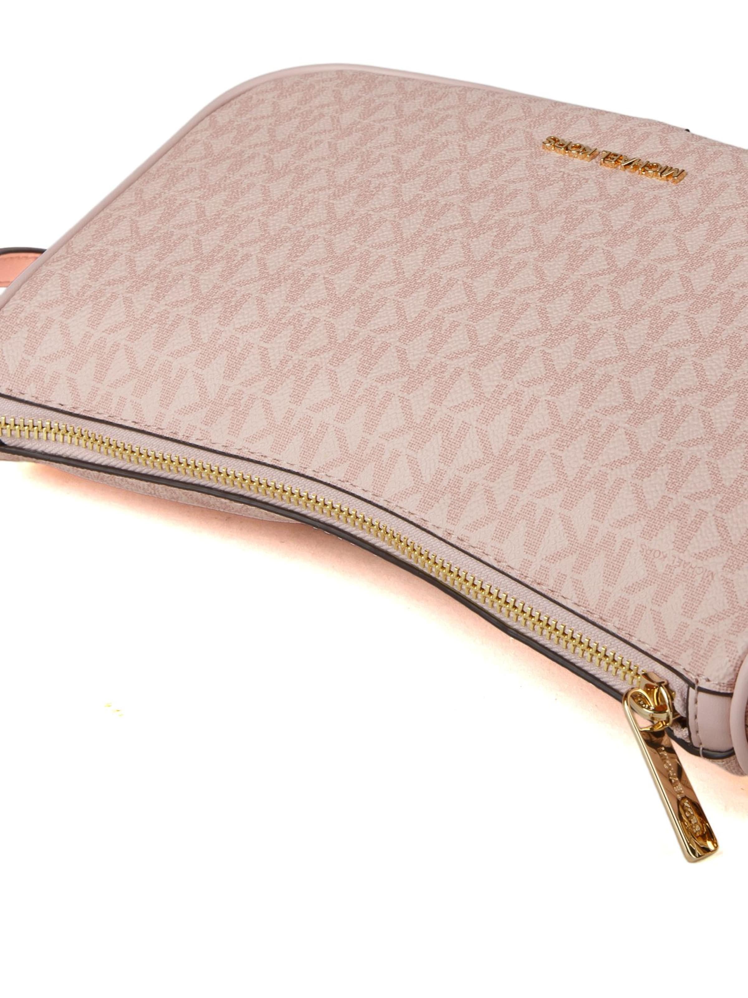 Michael Kors Umhängetasche 'Carmela Medium Signature Logo Convertible Crossbody Bag'‌‌‌‌‌‌ in Pink