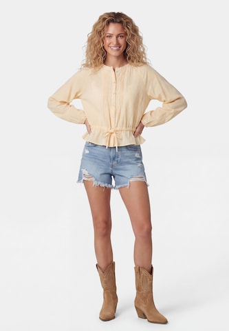 IZIA - Blusa en amarillo