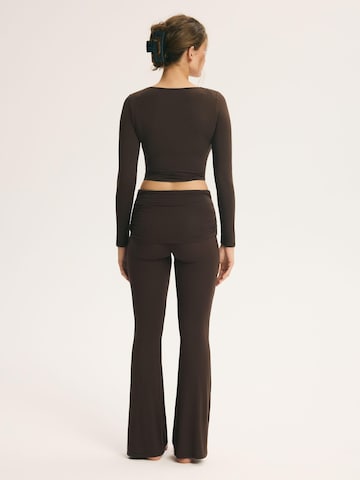 Flared Pantaloni di ESOTIQ in marrone