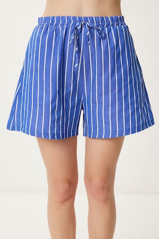Happiness İstanbul Loose fit Pants in Blue: front