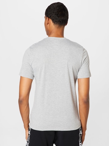 T-Shirt fonctionnel Reebok en gris