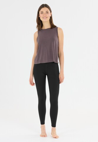 Athlecia Skinny Sports trousers 'Bloom' in Black