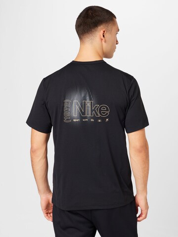 NIKE - Camiseta funcional 'HYVERSE' en negro