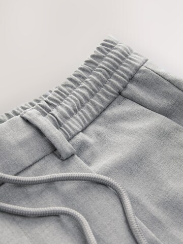 Next Slimfit Hlače na rob 'Edle' | siva barva