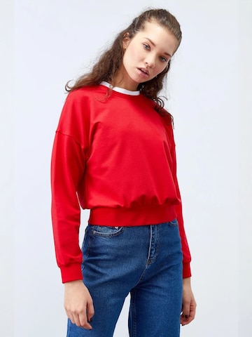 Sweat-shirt Tommy Life en rouge