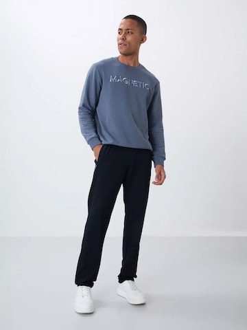 Tommy Liferegular Sportske hlače 'Jogginghose' - crna boja