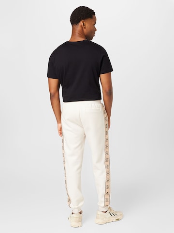 Effilé Pantalon 'MICKEY' GUESS en blanc