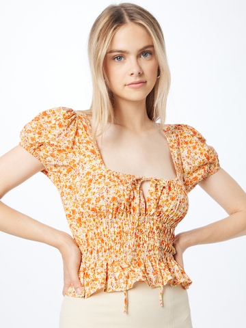 Motel - Blusa 'Galo' em laranja: frente