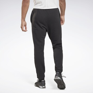 Reebok Tapered Workout Pants in Black