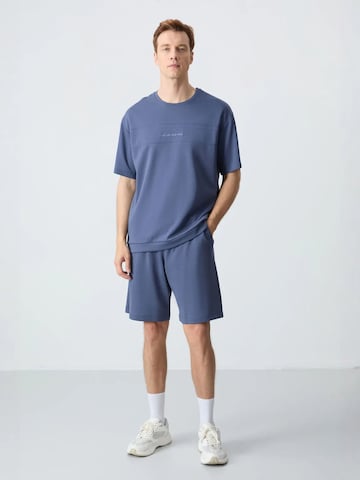 Survêtement Tommy Life en bleu : devant