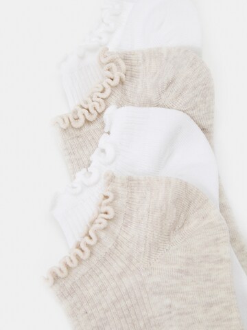 smėlio Lindex Kojinės