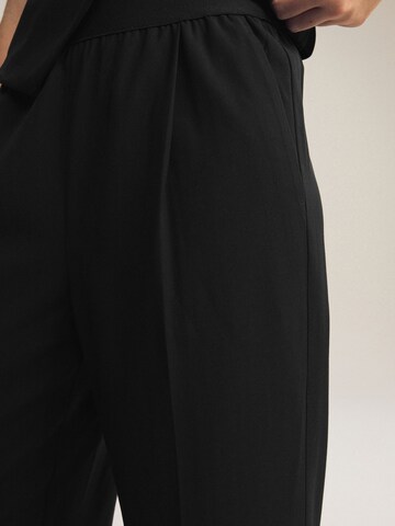 Wide leg Pantaloni di Next in nero