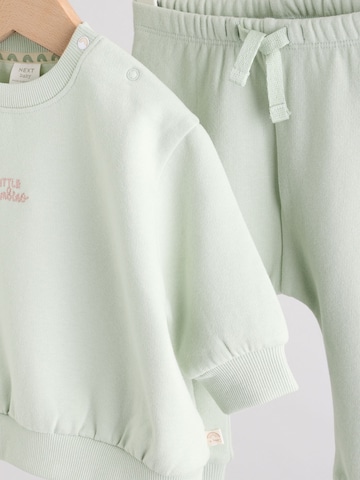 Next Juoksupuku värissä vihreä