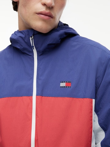 Tommy Jeans Tussenjas 'CHICAGO' in Rood