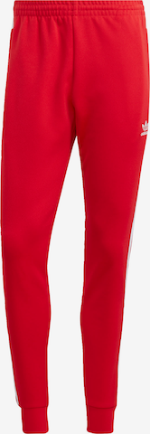 ADIDAS ORIGINALS Zwężany krój Spodnie 'Adicolor Classics Sst' w kolorze czerwony: przód