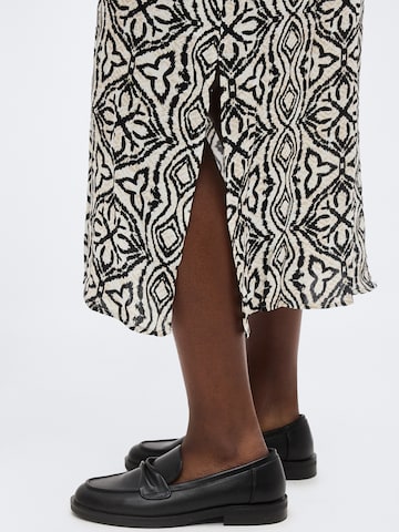 Robe 'VMCMENNY' Vero Moda Curve en beige