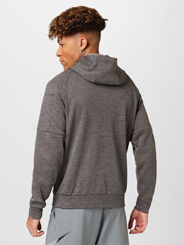 NIKE - Sudadera con cremallera deportiva en gris