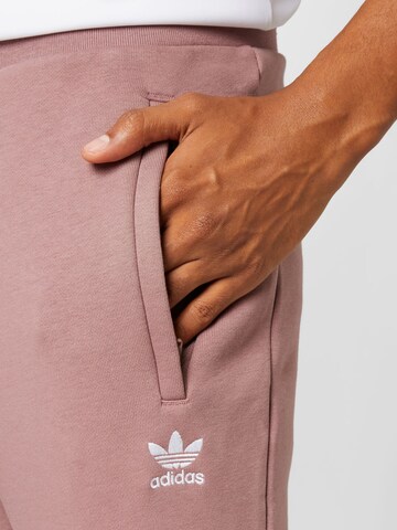 rožinė ADIDAS ORIGINALS Siaurėjantis Kelnės 'Adicolor Essentials Trefoil'