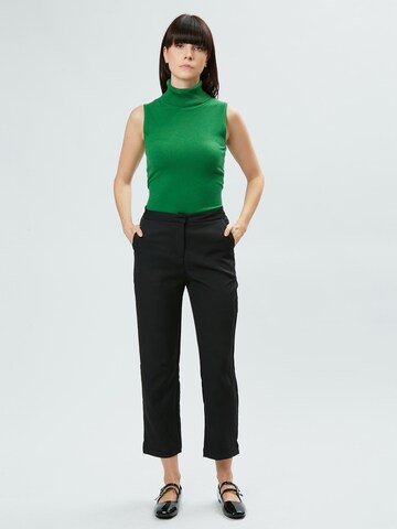 Top in maglia di Influencer in verde