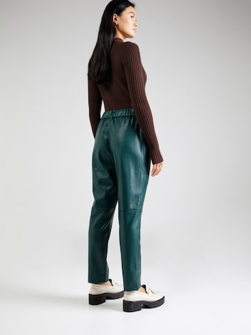MEXX Zwężany krój Spodnie w kolorze zielony