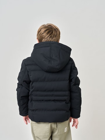 Manteau Deeluxe en noir