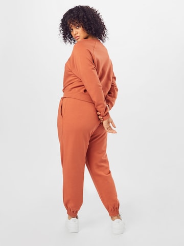 Effilé Pantalon 'Naomi' ABOUT YOU Curvy en orange
