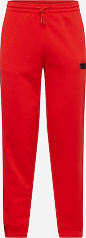 LEVI'S ® Zwężany krój Spodnie 'Graphic Piping Sweatpant' w kolorze czerwony: przód