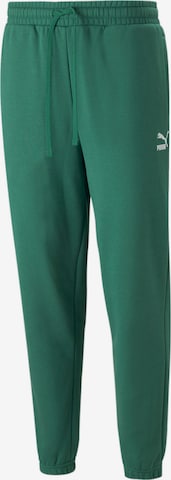 PUMA Workout Pants in Green: front