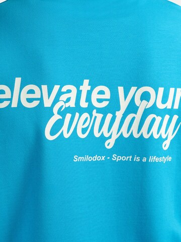 Smilodox T-Shirt Oversize Backprint Tamio in Blau