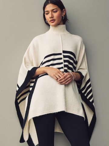 Next Kappe i beige: forside
