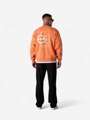 ESTEEM Sweatshirt 'Opposé' in Orange