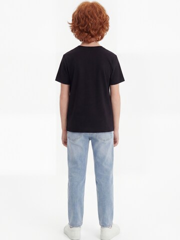 GUESS T-Shirt in Schwarz