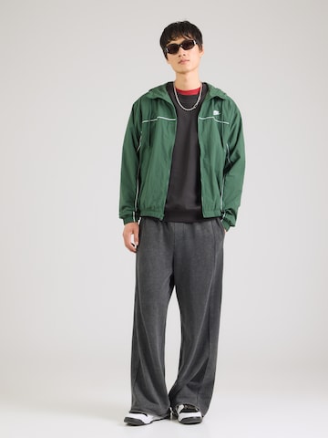 Veste mi-saison 'CLUB ATHLETE' Nike Sportswear en vert