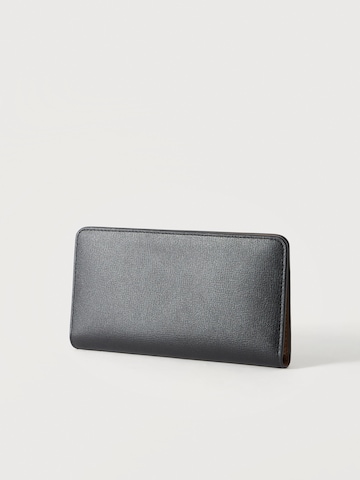 Portamonete 'PASSPORT' di Calvin Klein in nero