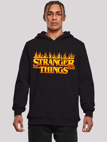 Sweat-shirt 'Stranger Things Netflix TV Series' F4NT4STIC en noir : devant