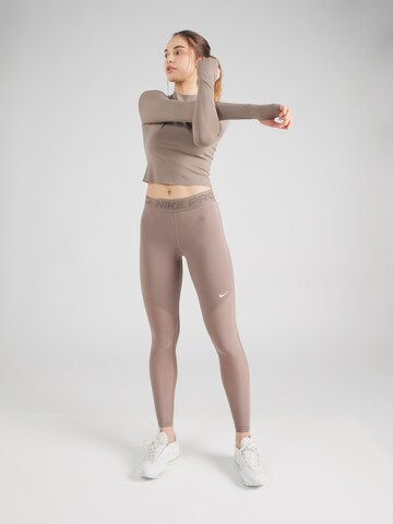NIKE Funkční tričko – hnědá